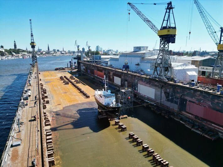 a large ship docked aboard SPIRIT OF GINETTE Yacht for Sale