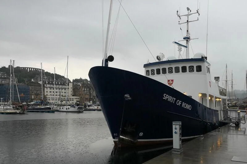 a large ship docked aboard SPIRIT OF GINETTE Yacht for Sale