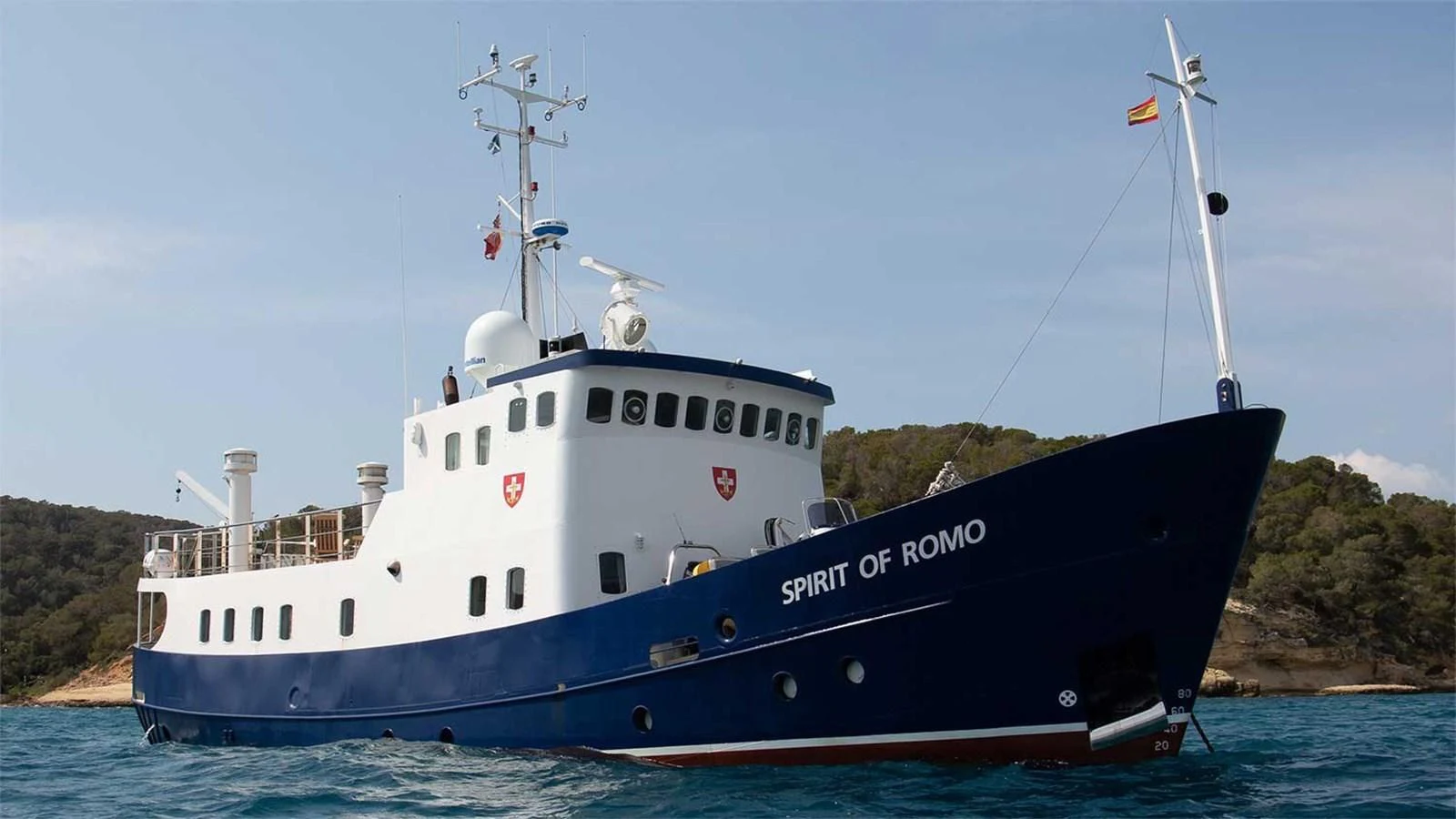 a large blue and white boat aboard SPIRIT OF GINETTE Yacht for Sale