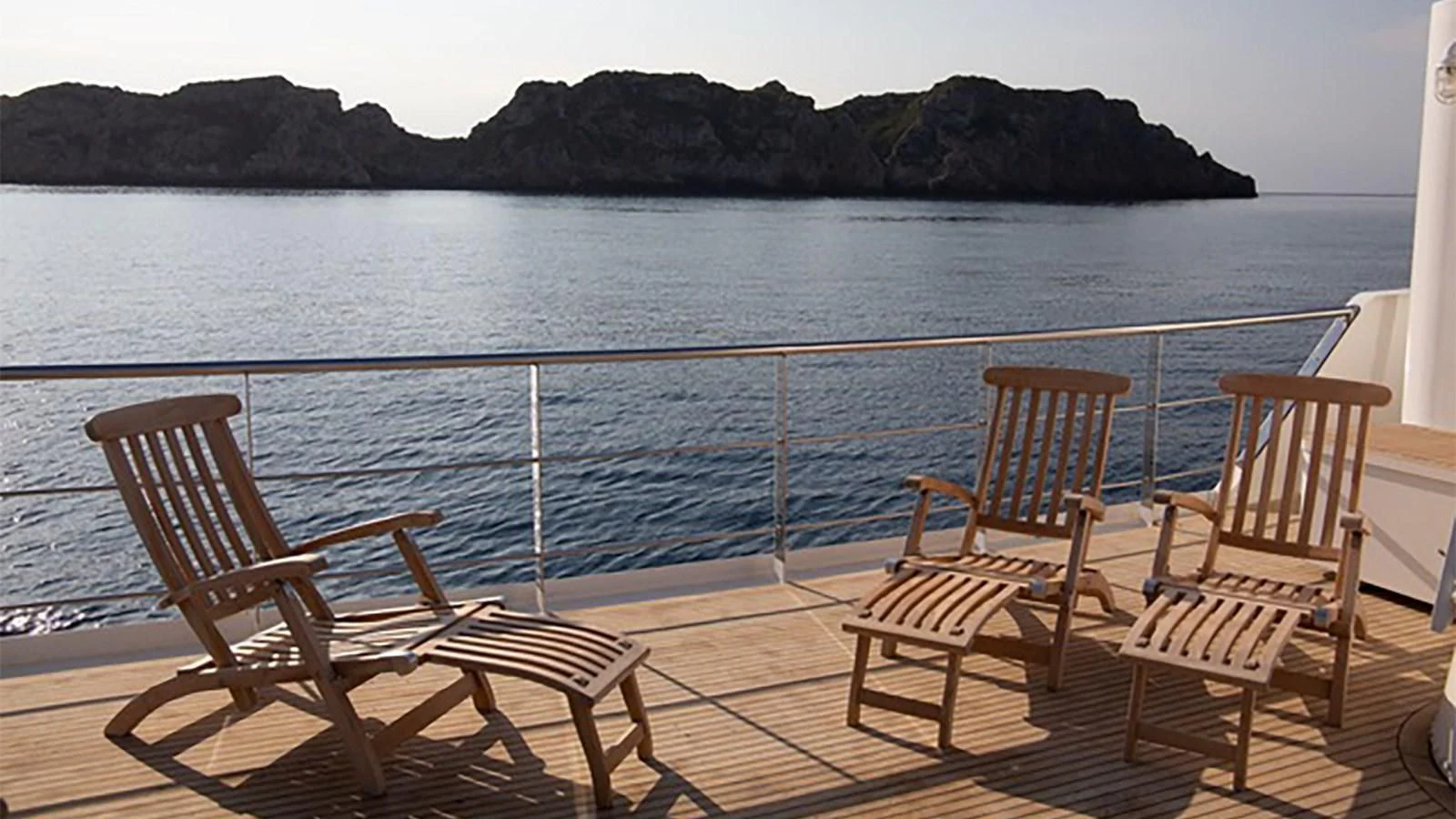 chairs on a dock aboard SPIRIT OF GINETTE Yacht for Sale