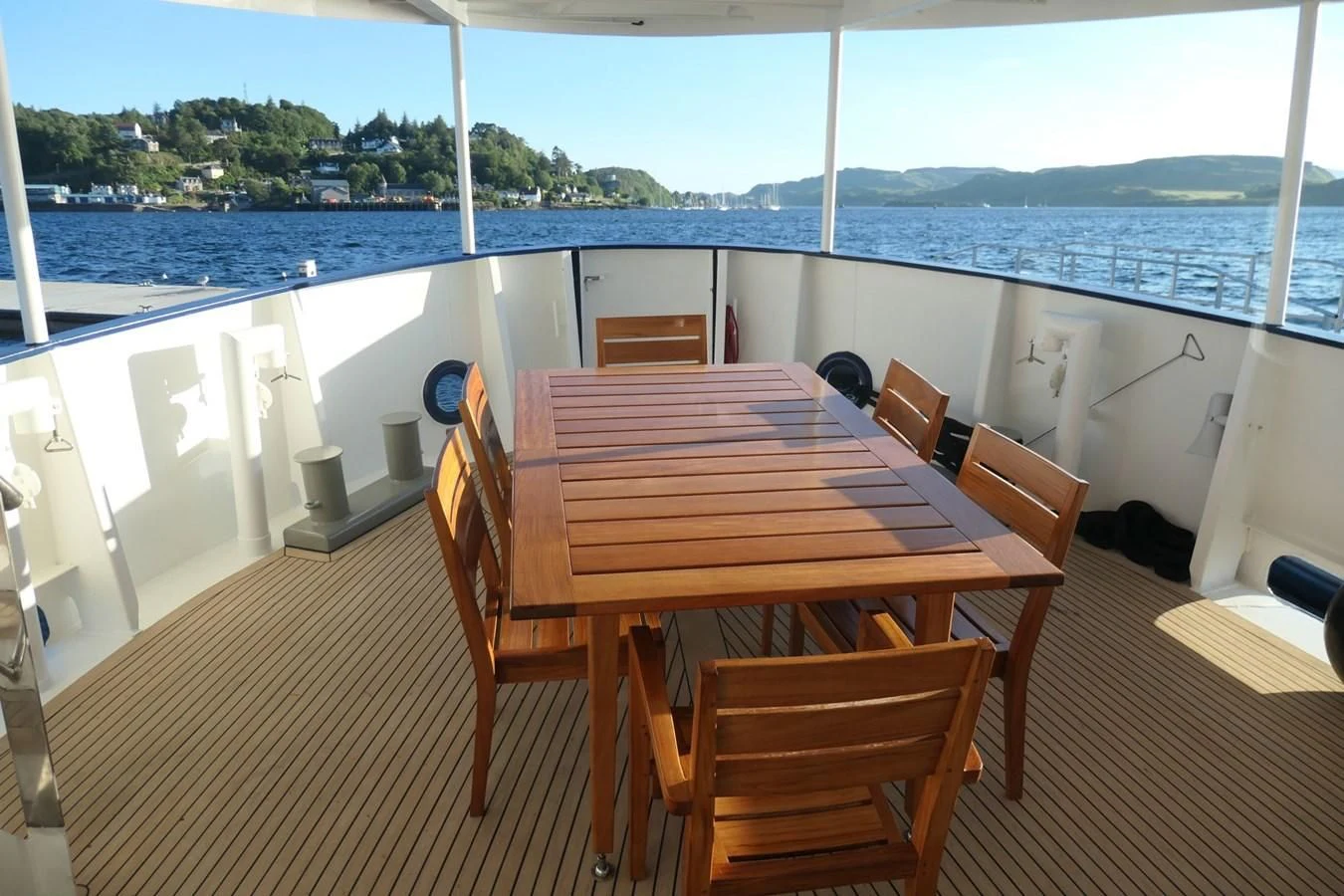 a table on a deck aboard SPIRIT OF GINETTE Yacht for Sale