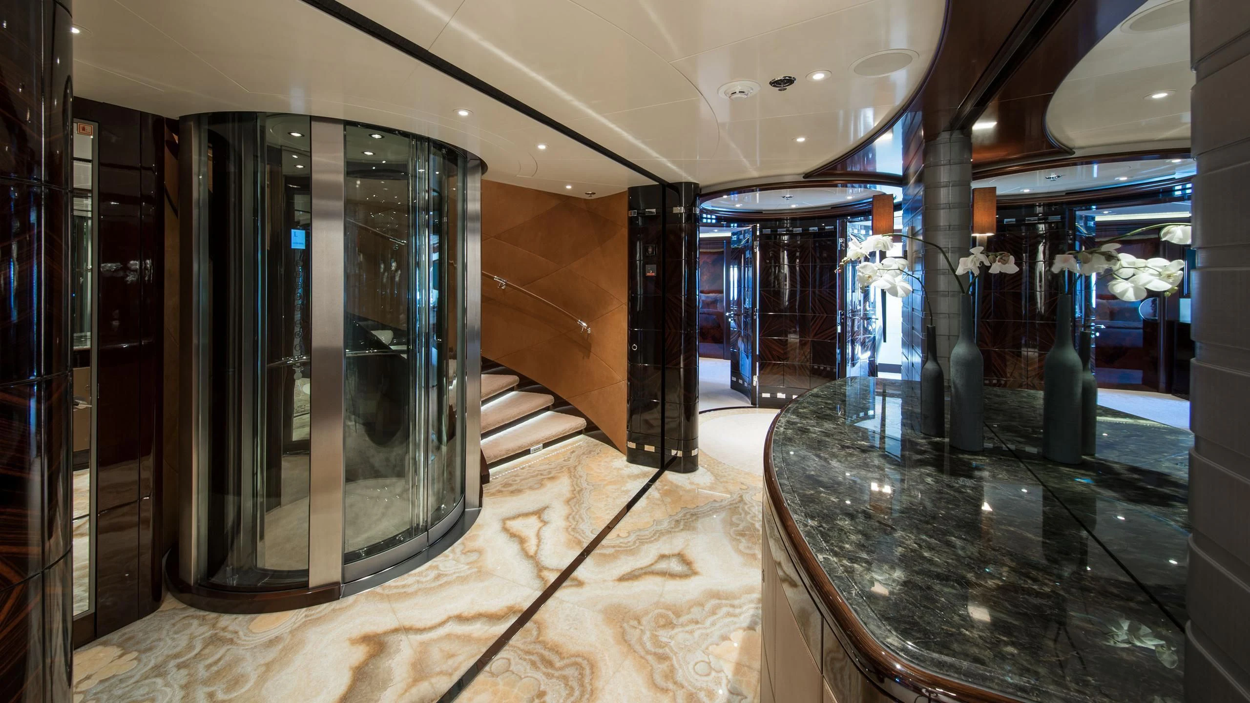 a large glass display case aboard EMINENCE Yacht for Sale