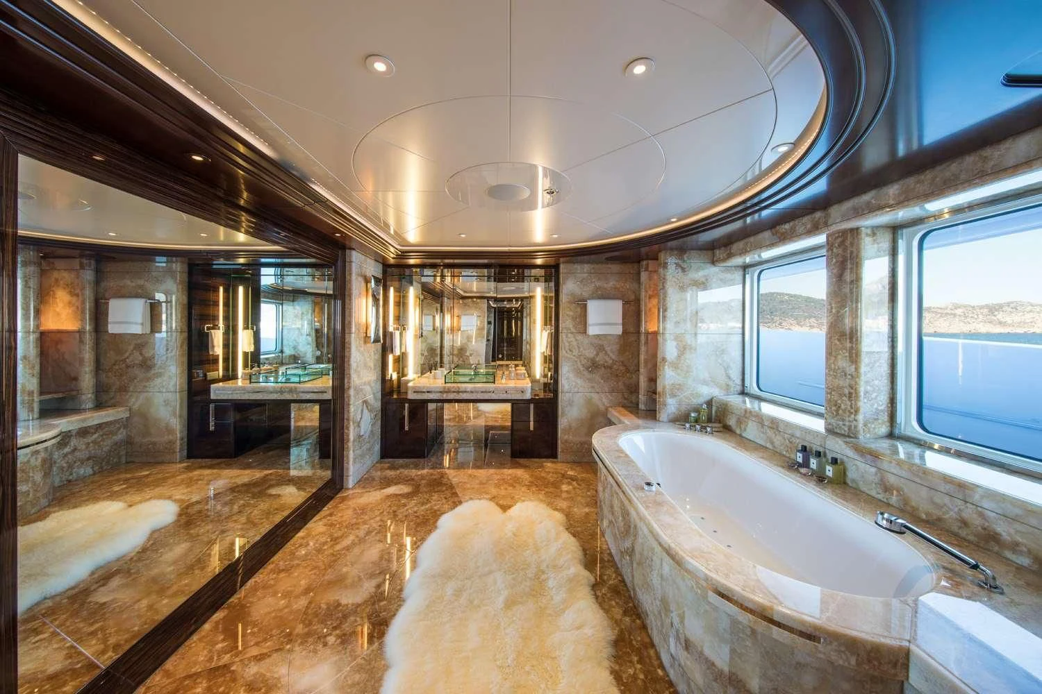 a large bathroom with a large jacuzzi tub aboard EMINENCE Yacht for Sale