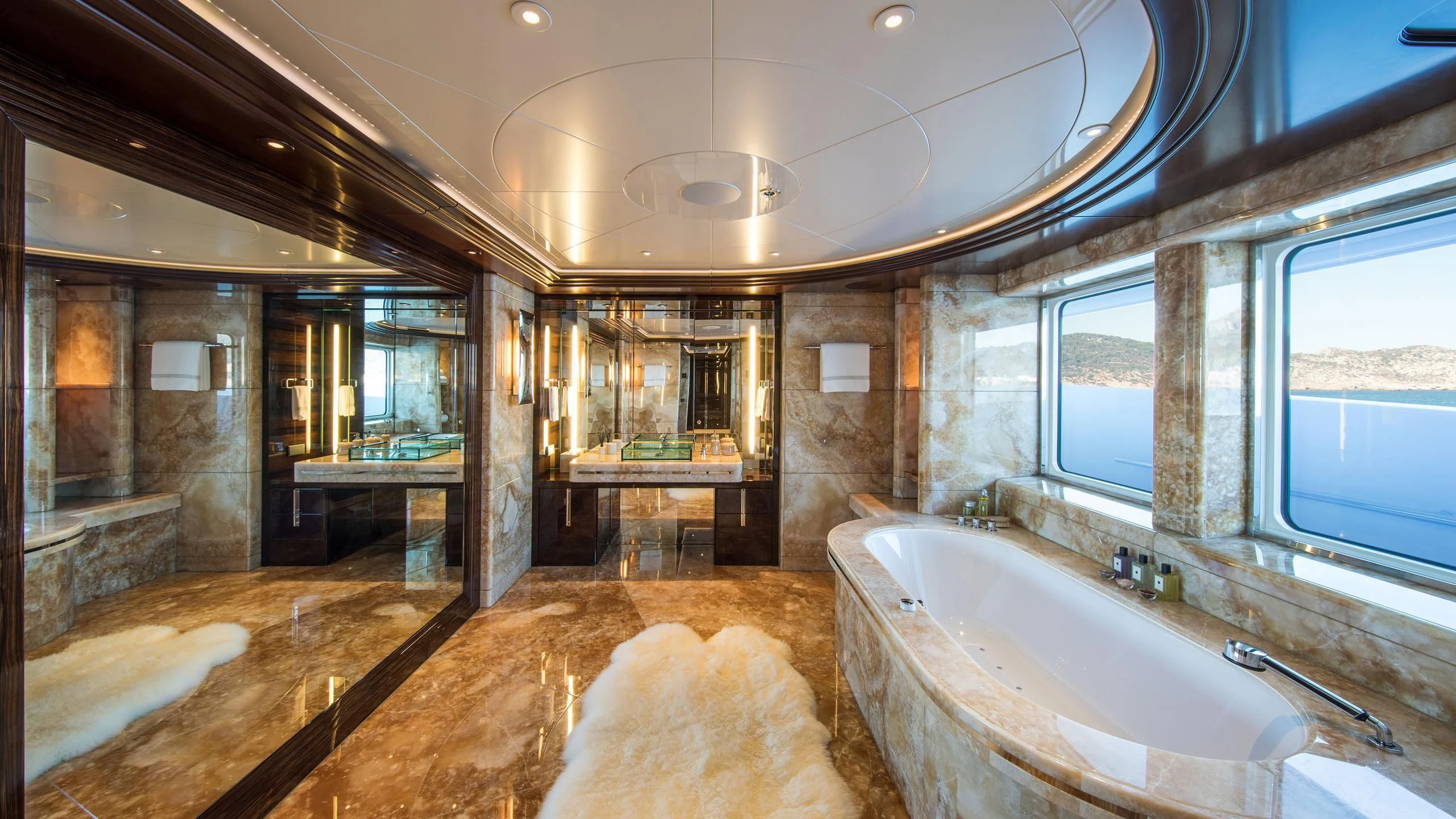 a large bathroom with a large bathtub aboard EMINENCE Yacht for Sale