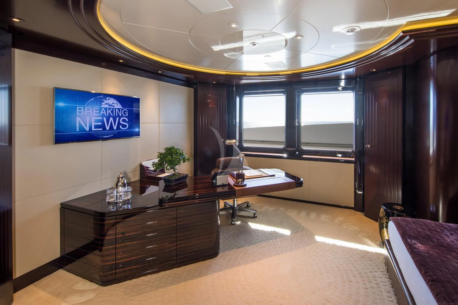 a room with a table and chairs aboard EMINENCE Yacht for Sale