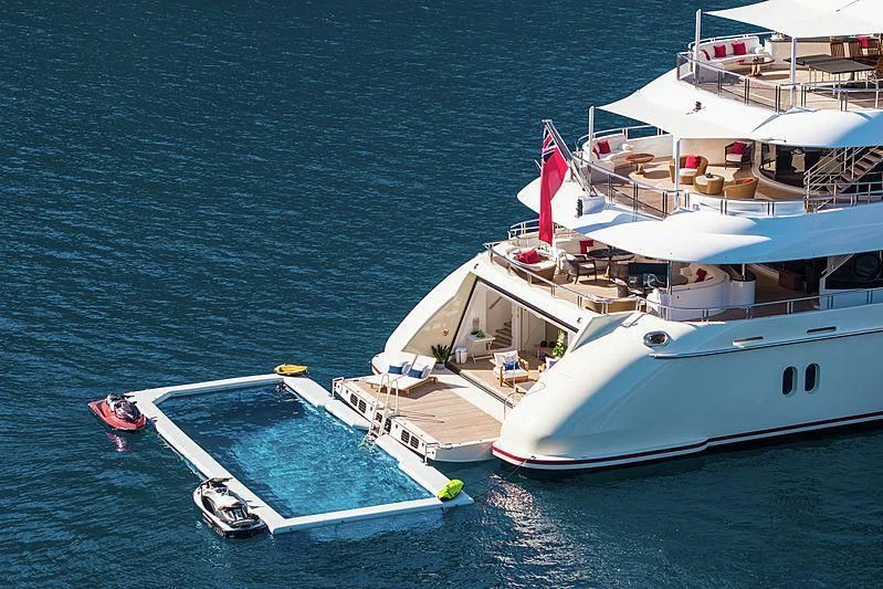 a boat in the water aboard EMINENCE Yacht for Sale