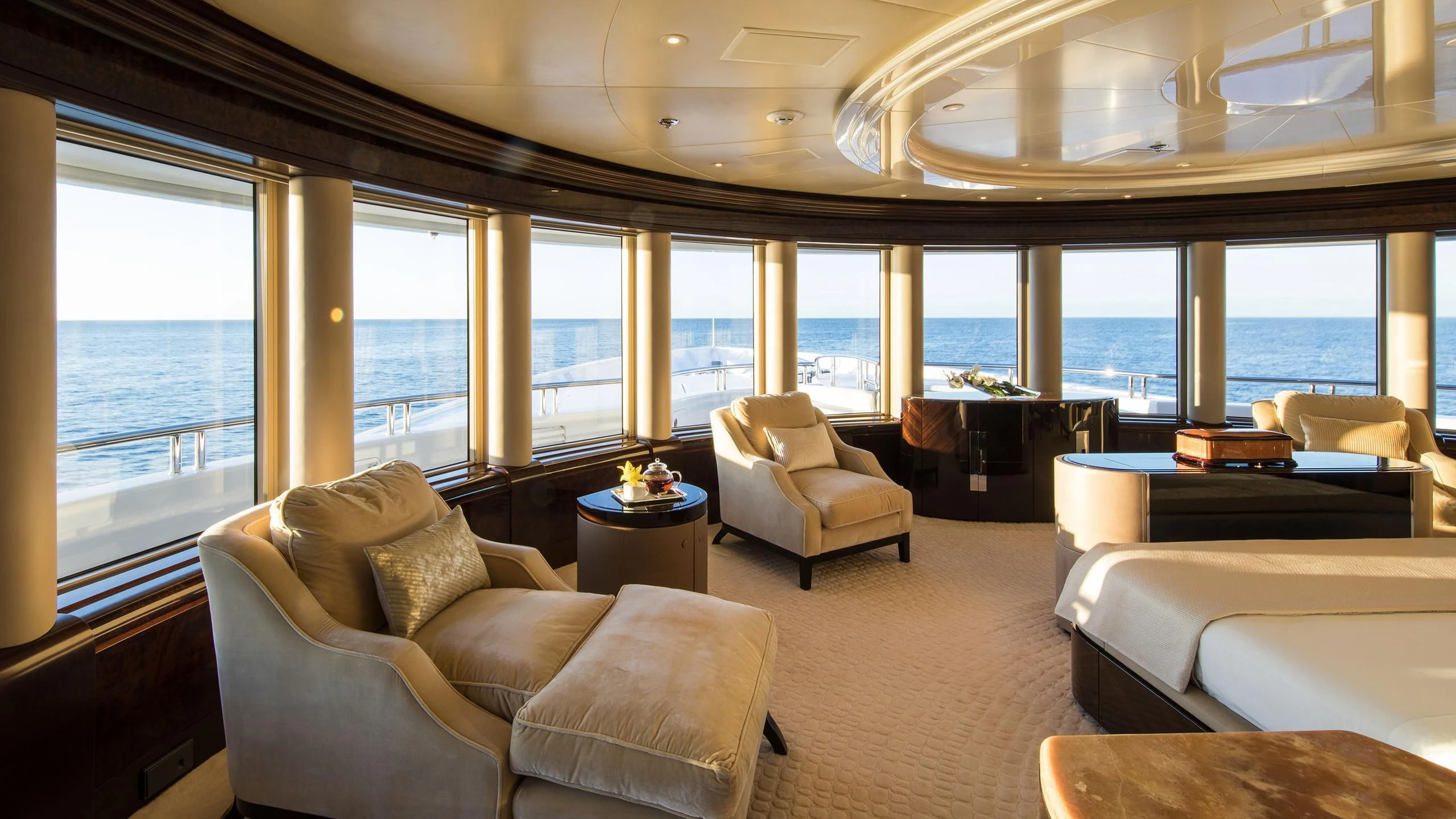 a living room with a large window aboard EMINENCE Yacht for Sale