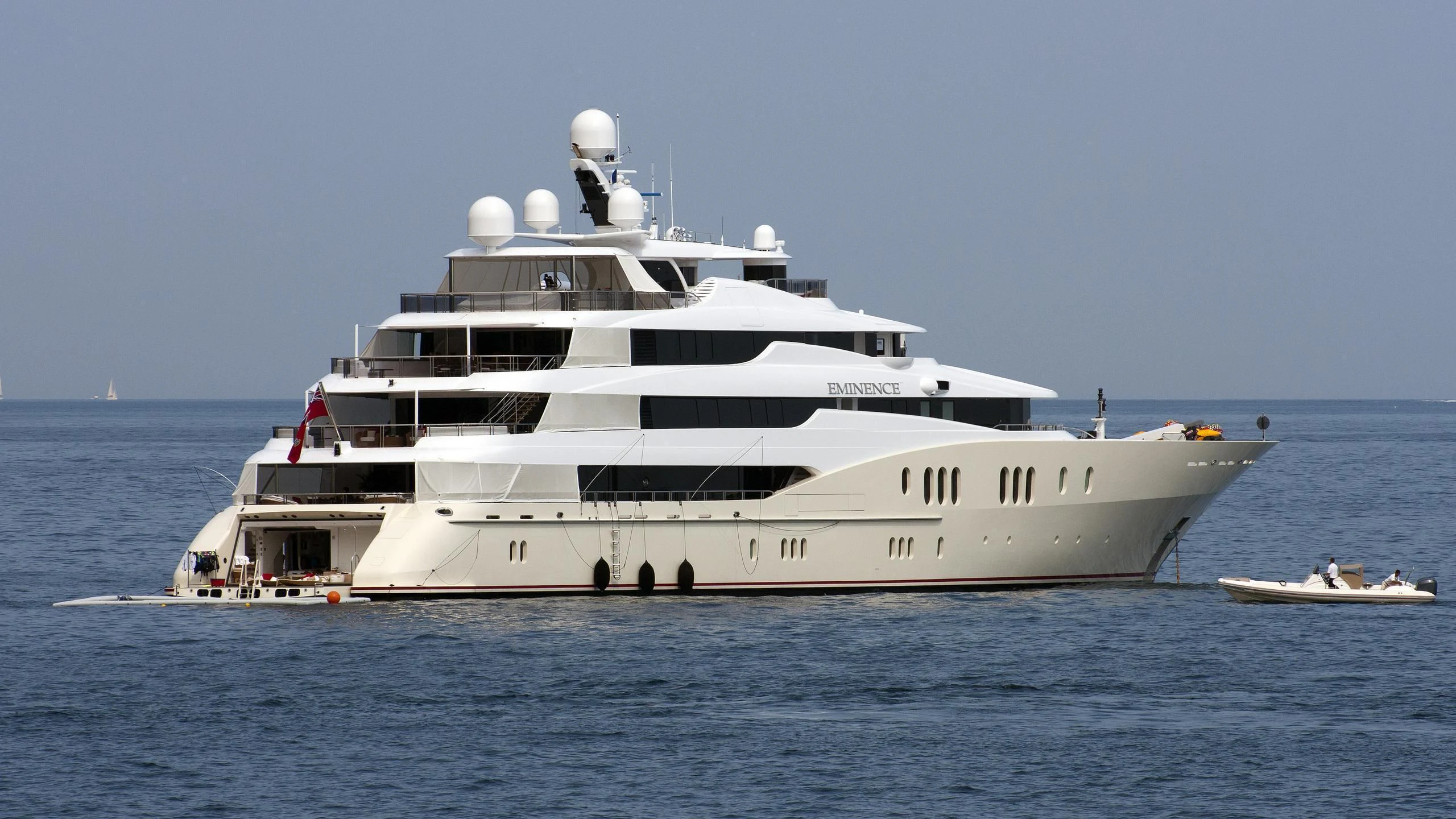 a large white yacht aboard EMINENCE Yacht for Sale