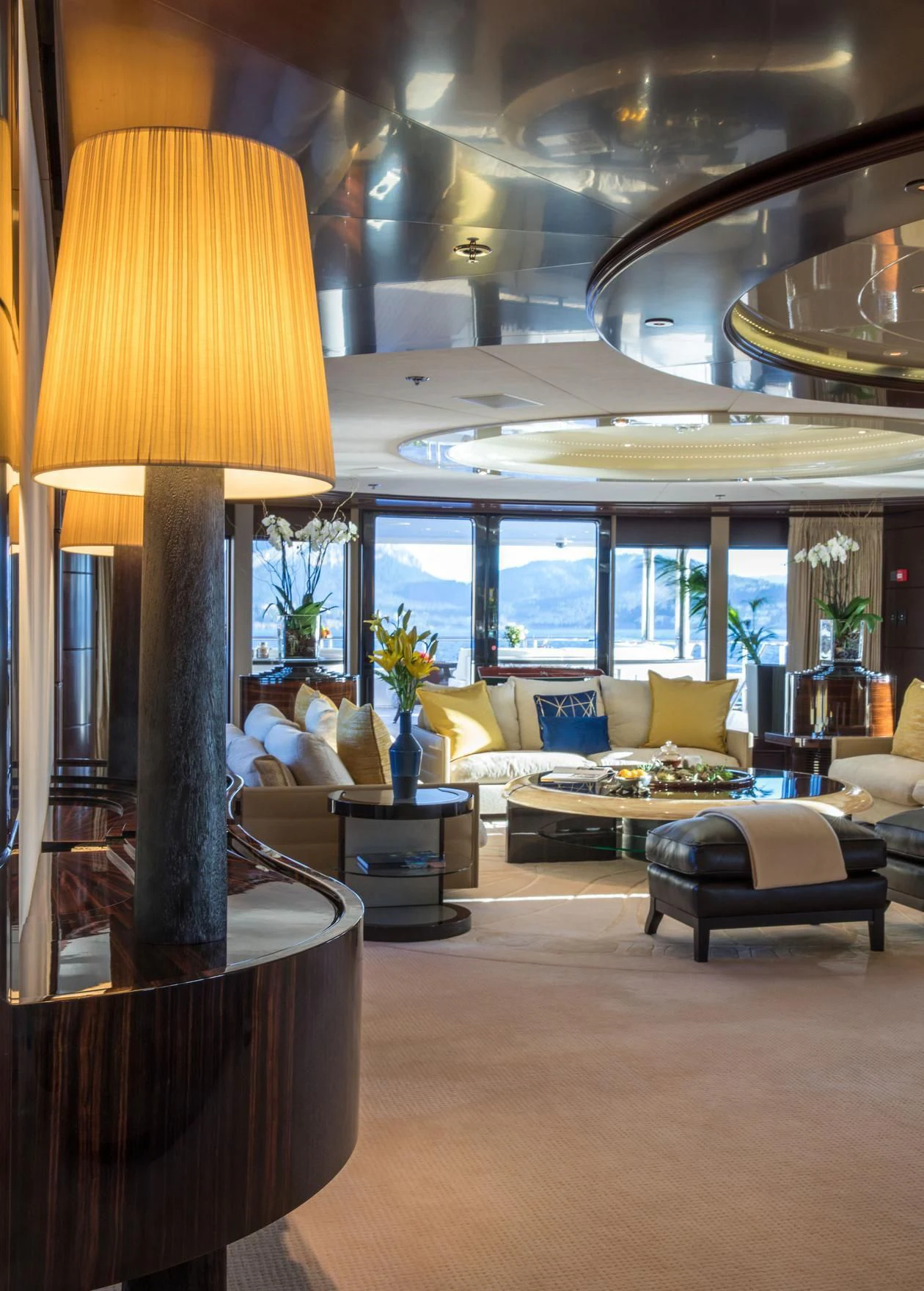 a living room with a large window aboard EMINENCE Yacht for Sale