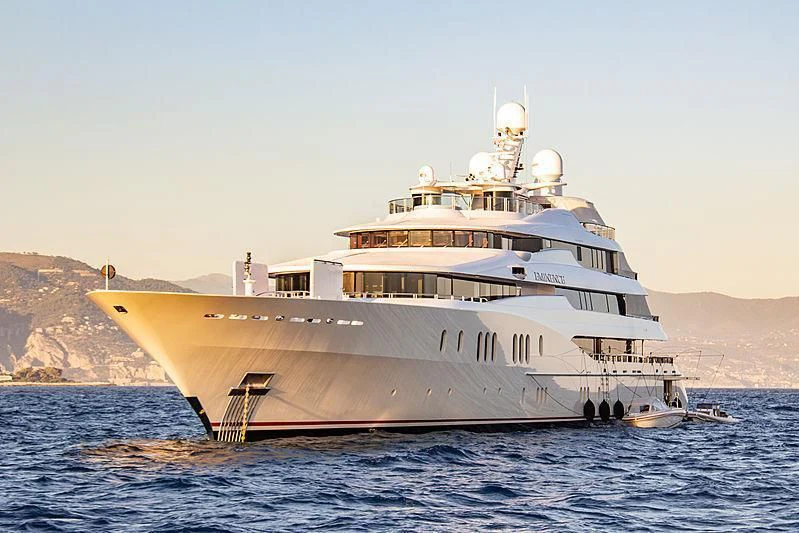 a large white ship in the water aboard EMINENCE Yacht for Sale