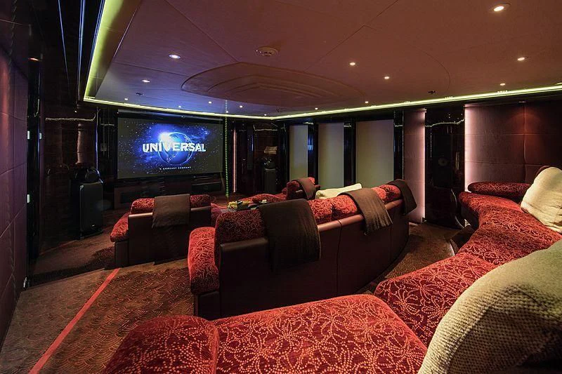 a living room with a tv aboard EMINENCE Yacht for Sale