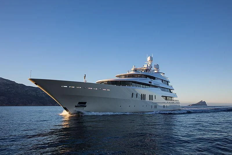a large ship on the water aboard EMINENCE Yacht for Sale