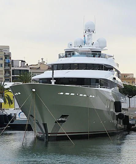 a large white boat in the water aboard EMINENCE Yacht for Sale