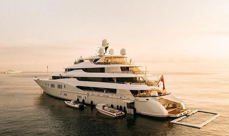 a large white boat in the water aboard EMINENCE Yacht for Sale