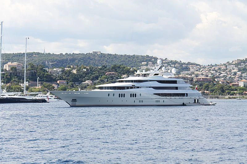 a large white boat in the water aboard EMINENCE Yacht for Sale