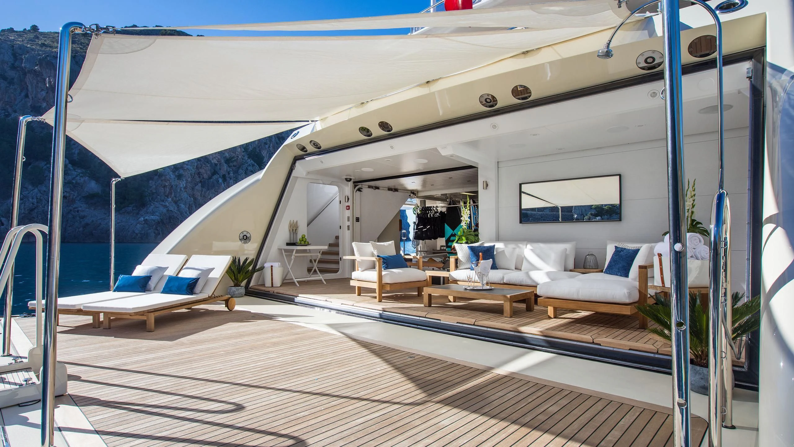 a large white boat with a deck aboard EMINENCE Yacht for Sale