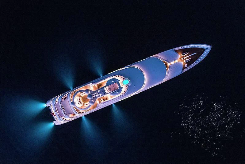 a guitar on a stage aboard EMINENCE Yacht for Sale