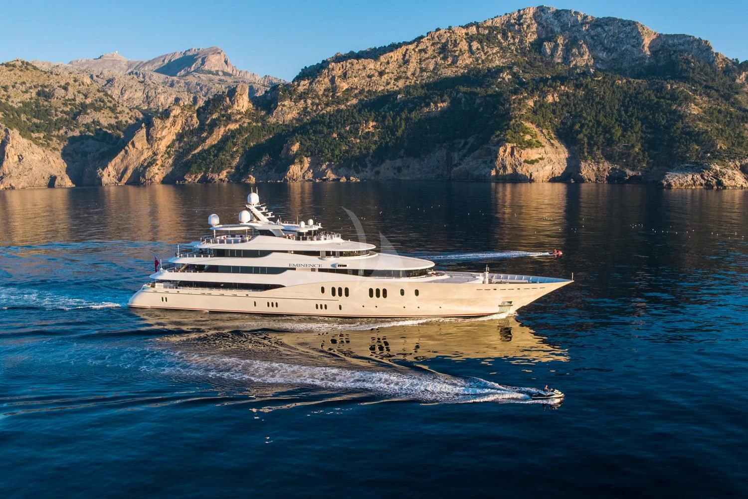 a ship sailing on water aboard EMINENCE Yacht for Sale