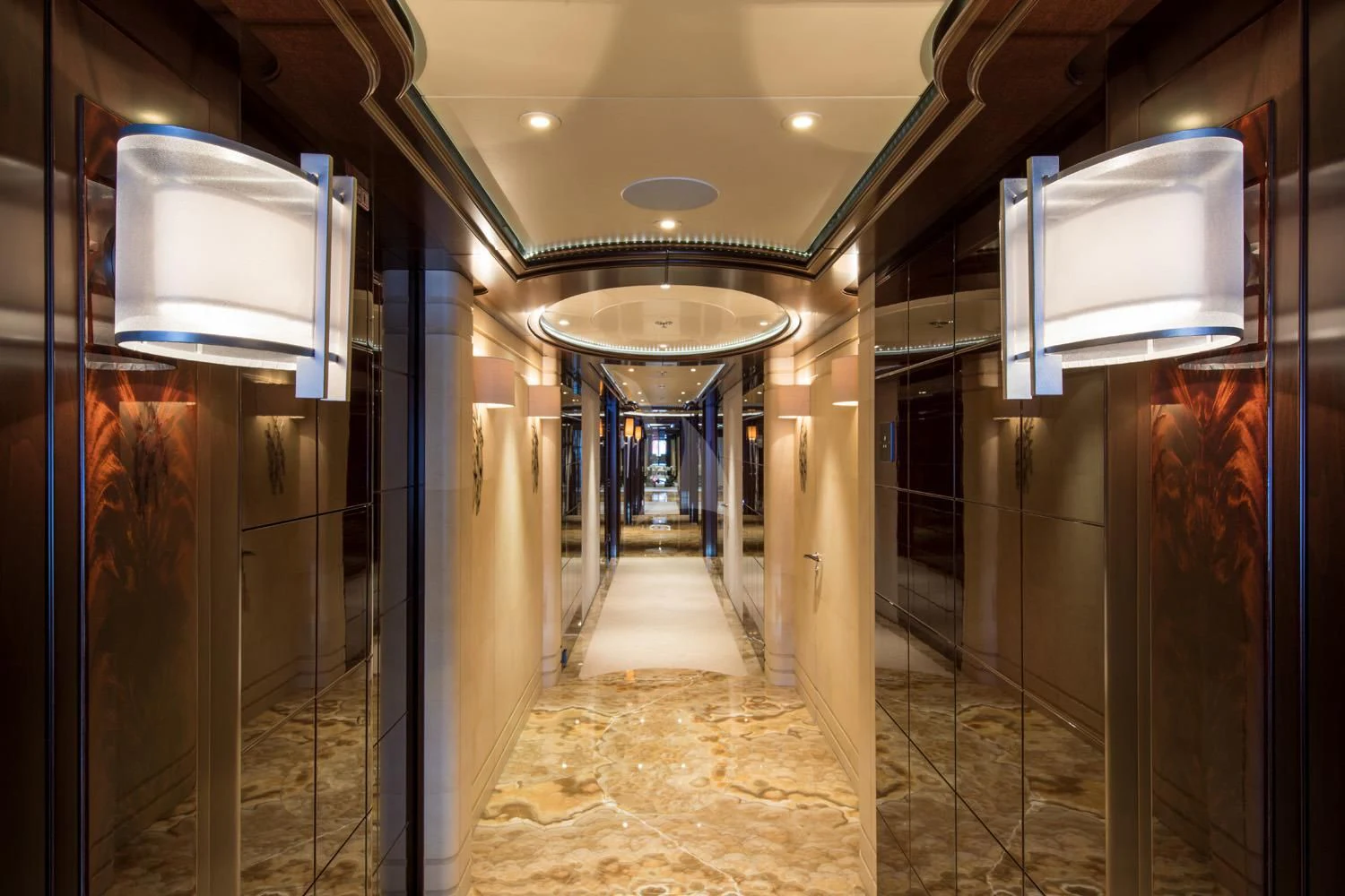 a hallway with a light aboard EMINENCE Yacht for Sale