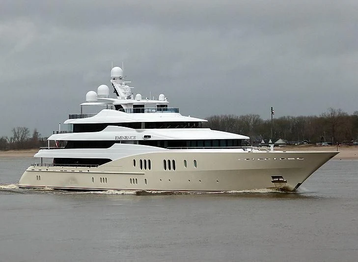 a large white boat in the water aboard EMINENCE Yacht for Sale