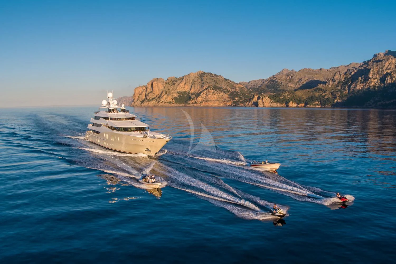 a boat with a rope attached to it in the water with a boat in the water in the aboard EMINENCE Yacht for Sale