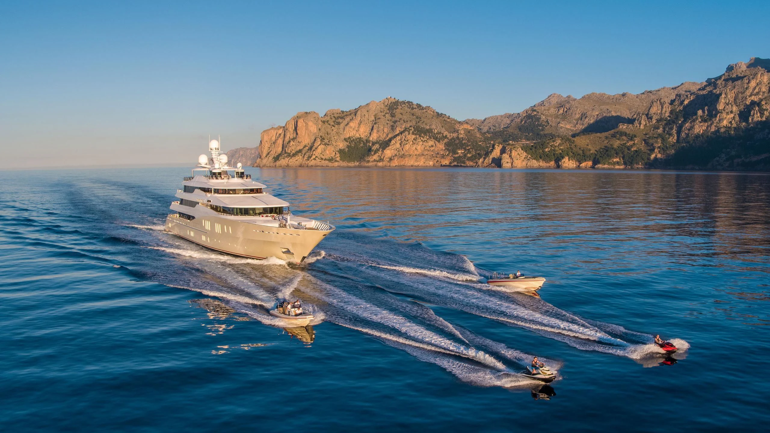 a boat and a boat in the water aboard EMINENCE Yacht for Sale