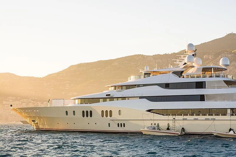 a large cruise ship in the water aboard EMINENCE Yacht for Sale