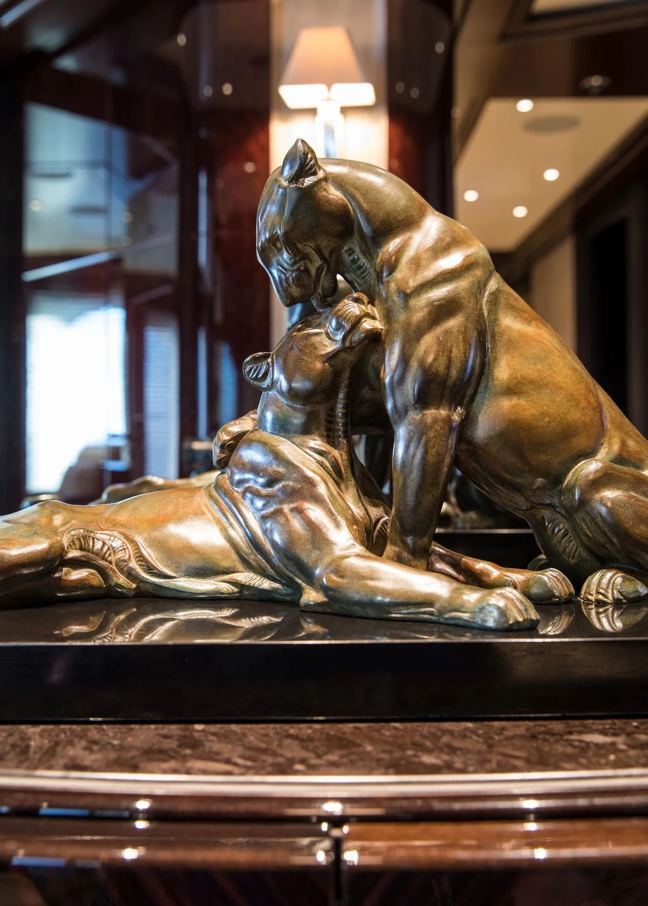 a statue of a lion aboard EMINENCE Yacht for Sale