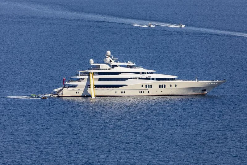 a white boat in the water aboard EMINENCE Yacht for Sale