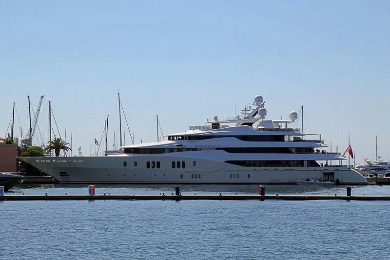 a large ship docked aboard EMINENCE Yacht for Sale