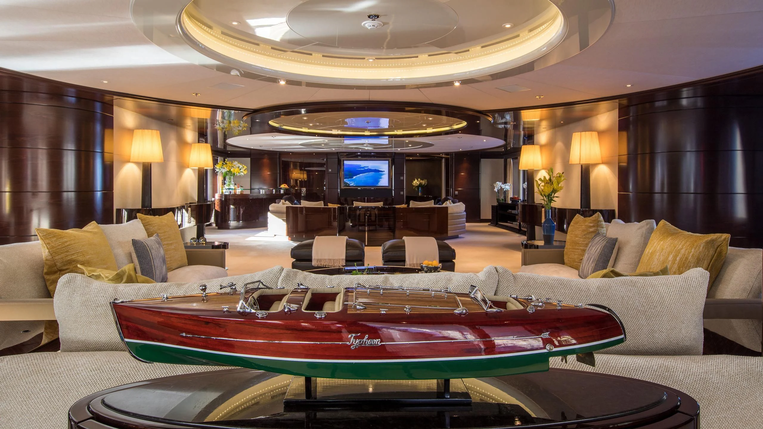 a large living room with a large pool table and a large television aboard EMINENCE Yacht for Sale