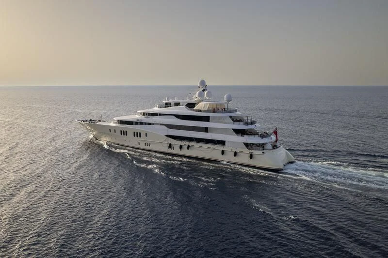 a white boat in the water aboard EMINENCE Yacht for Sale