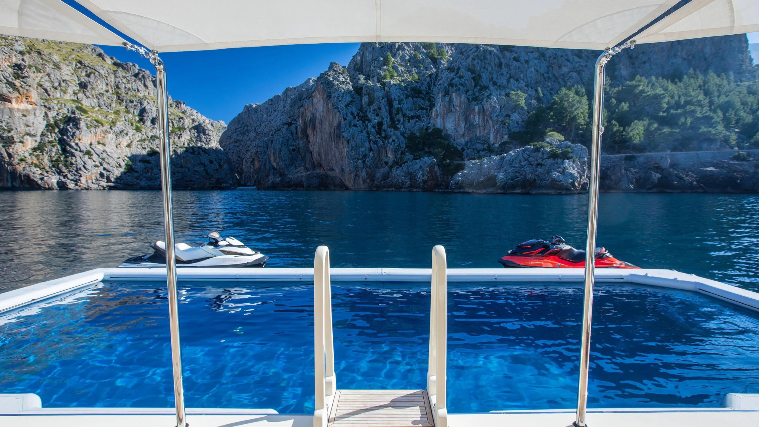 a boat on the water aboard EMINENCE Yacht for Sale