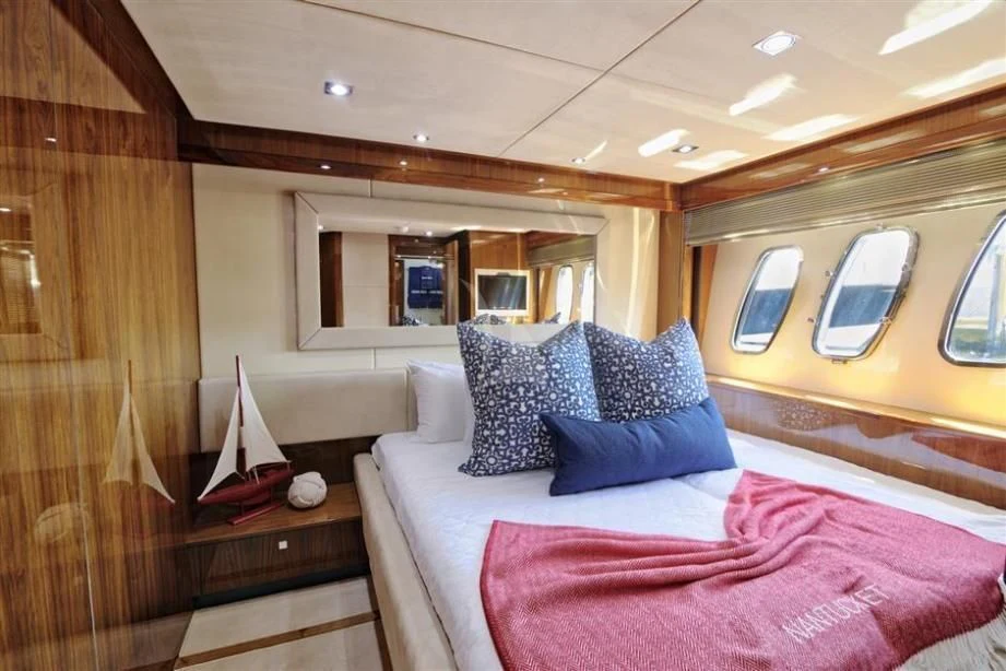 a bed in a room aboard THE CABANA Yacht for Sale