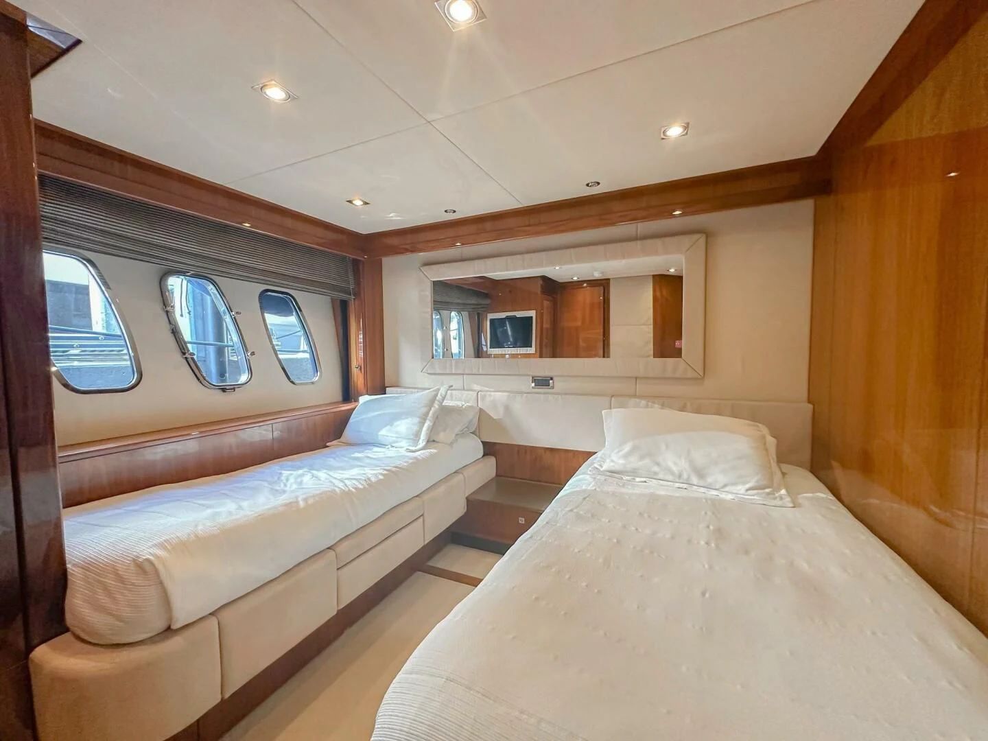 a room with two beds aboard THE CABANA Yacht for Sale