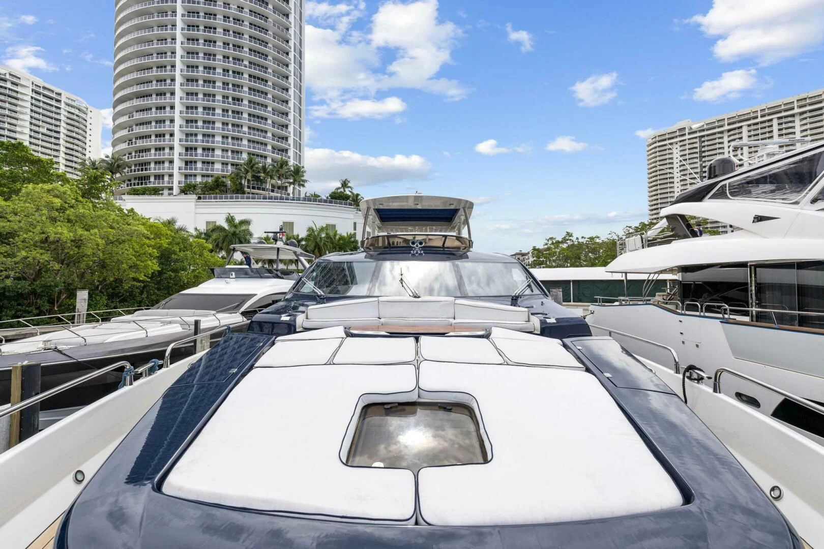 a yacht in a harbor aboard THE CABANA Yacht for Sale