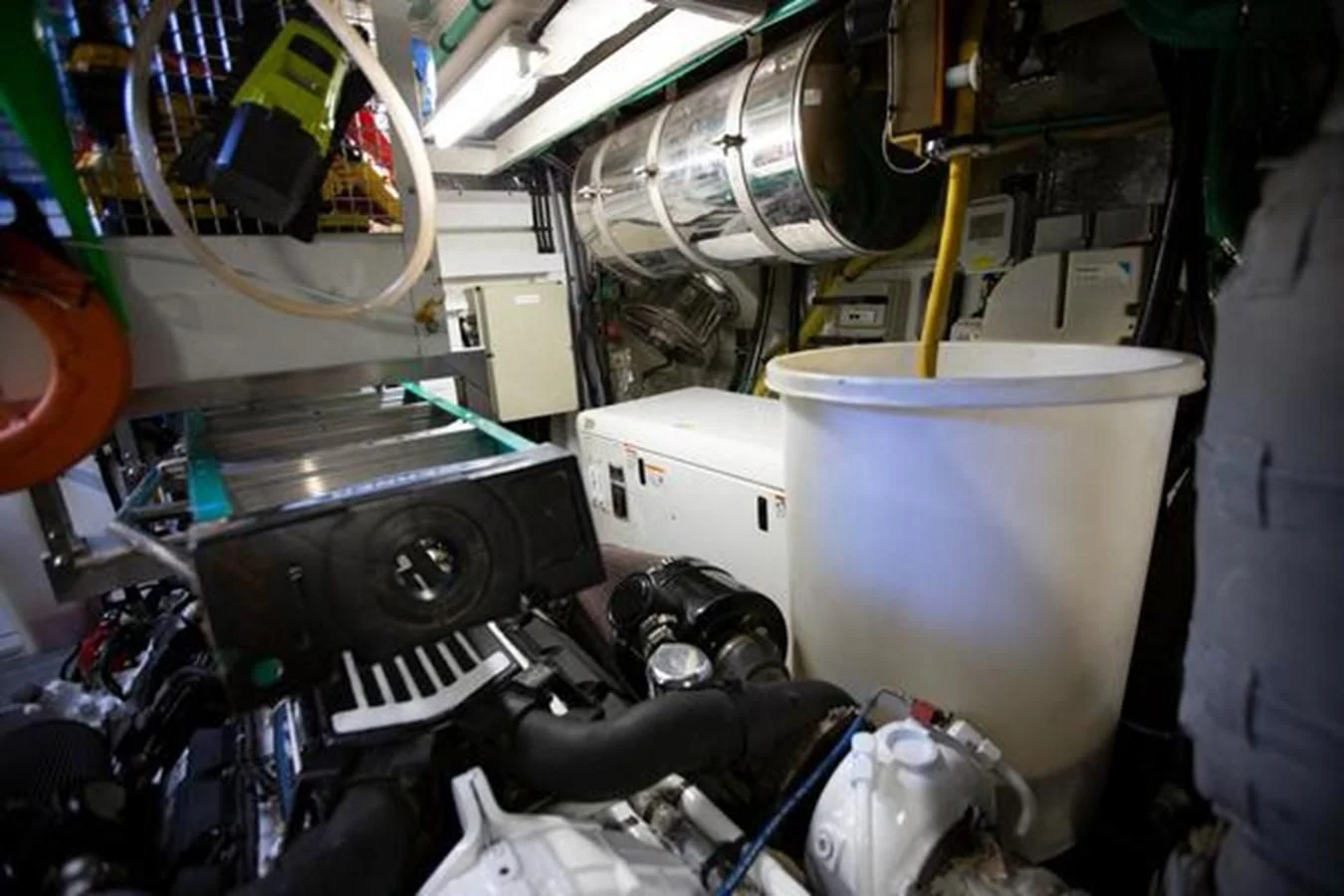 a machine with a large metal cylinder aboard THE CABANA Yacht for Sale