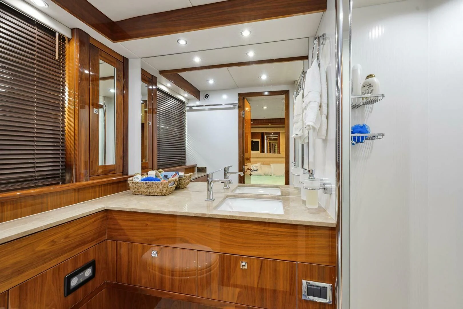 a bathroom with a large mirror aboard THE CABANA Yacht for Sale