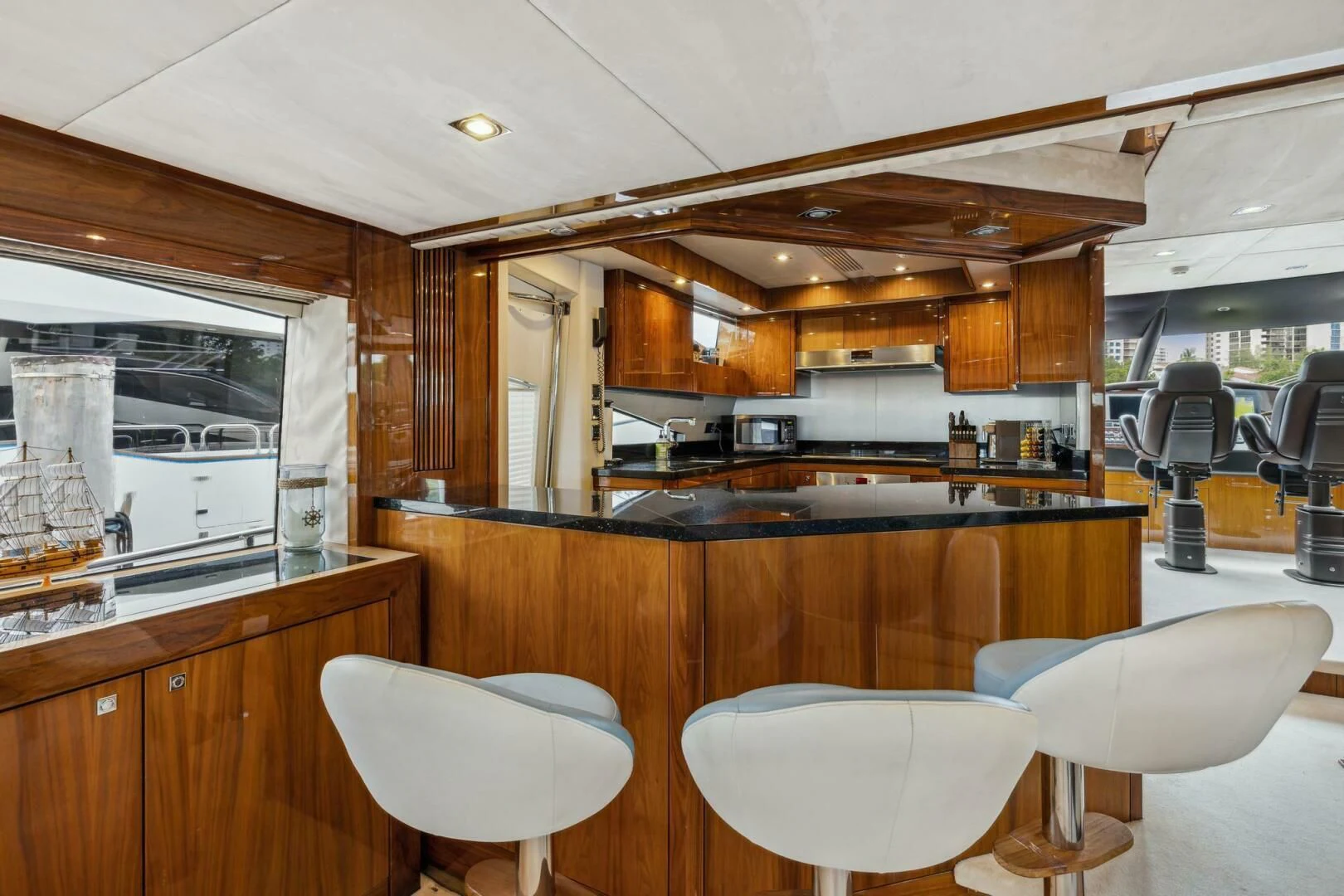 a kitchen with a large island aboard THE CABANA Yacht for Sale