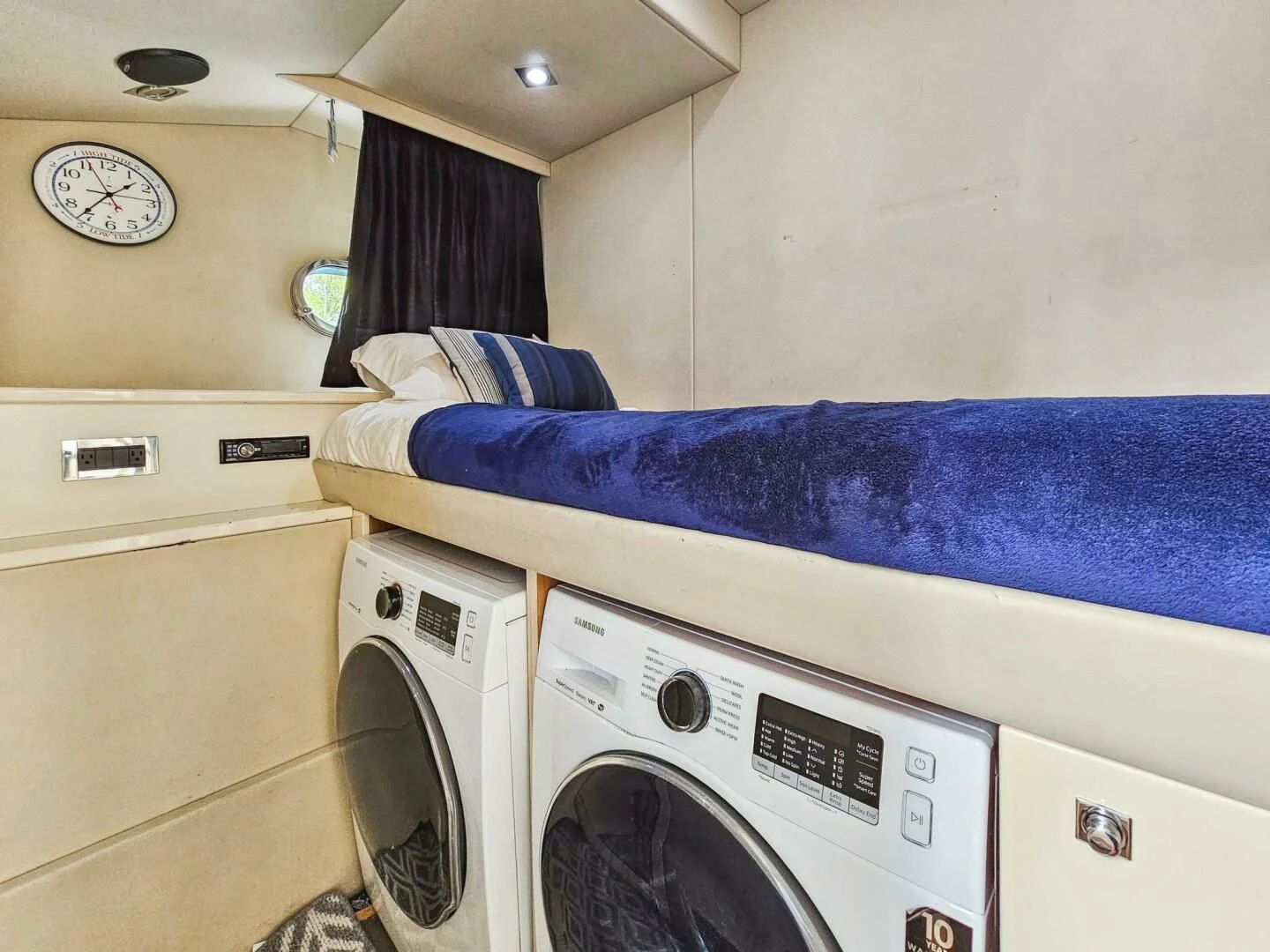 a laundry room with a washing machine aboard THE CABANA Yacht for Sale