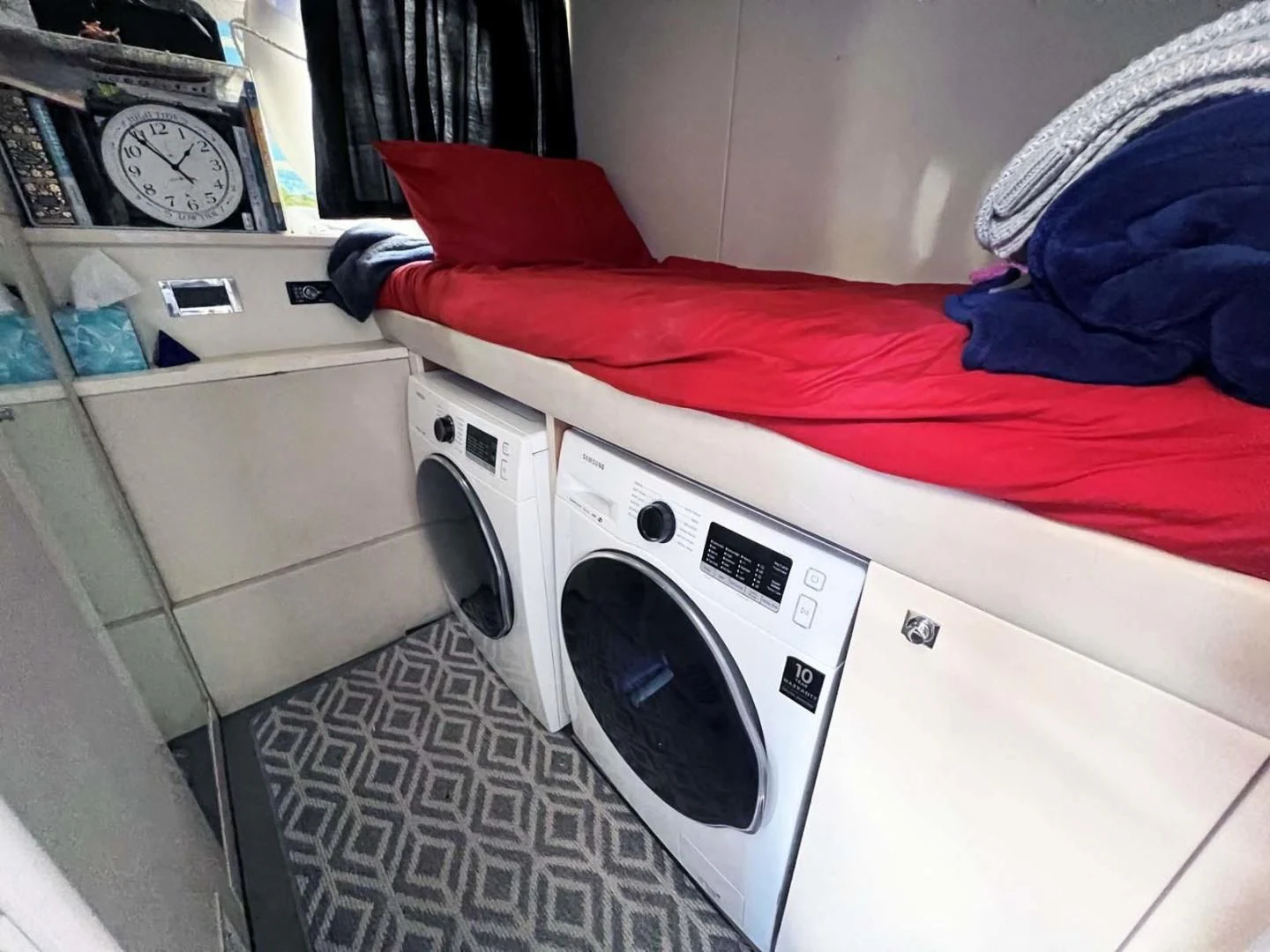 a white washing machine aboard THE CABANA Yacht for Sale