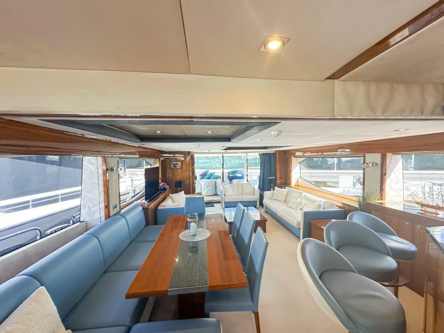 a room with a table and chairs aboard THE CABANA Yacht for Sale