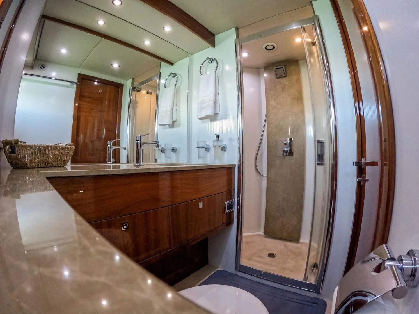 a bathroom with a large mirror aboard THE CABANA Yacht for Sale