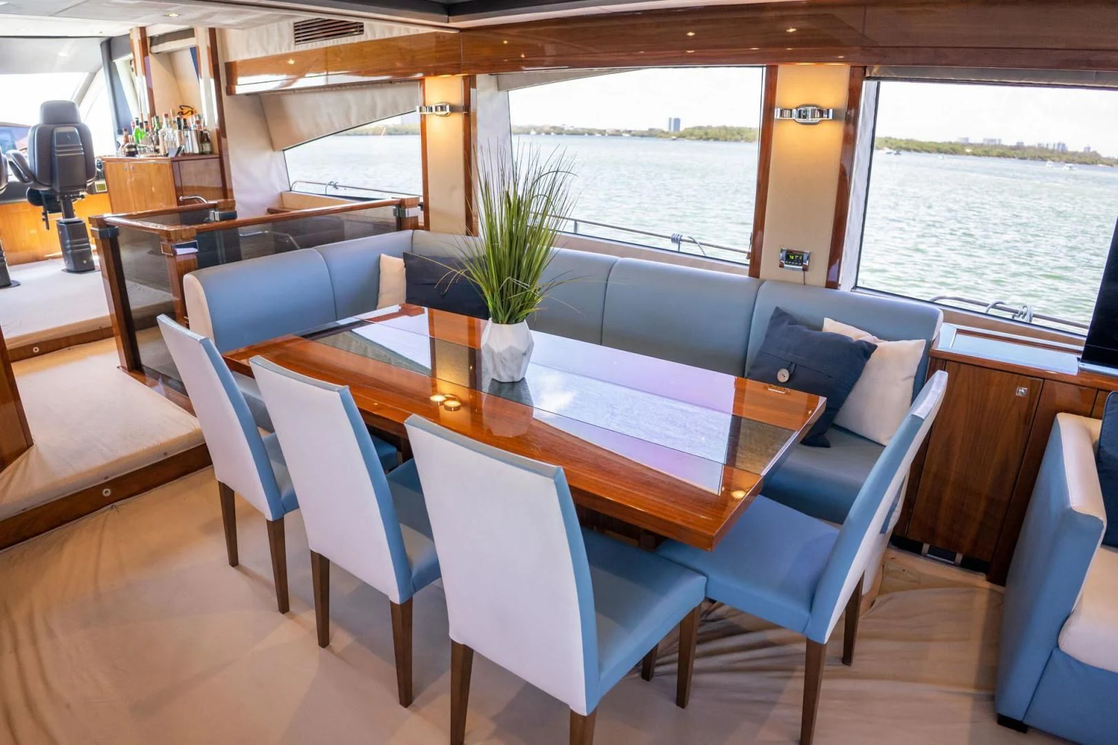 a dining room with a table and chairs aboard THE CABANA Yacht for Sale