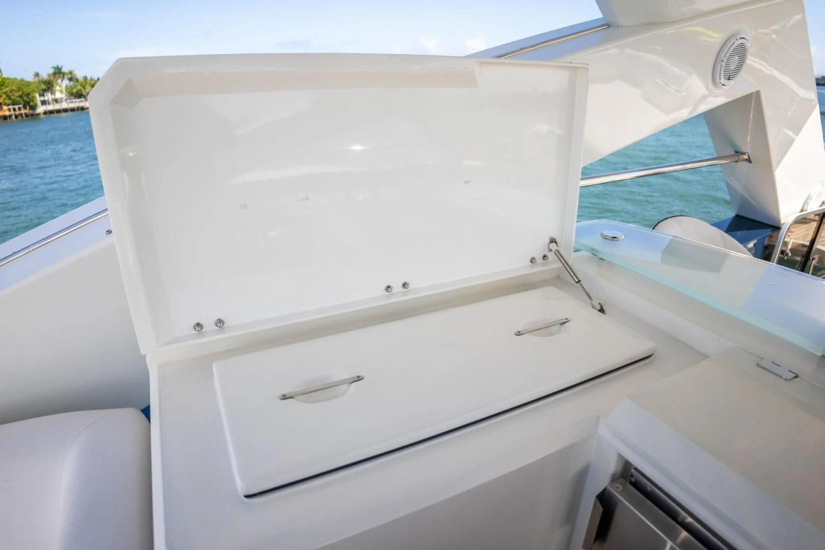 a white boat with a handle aboard THE CABANA Yacht for Sale