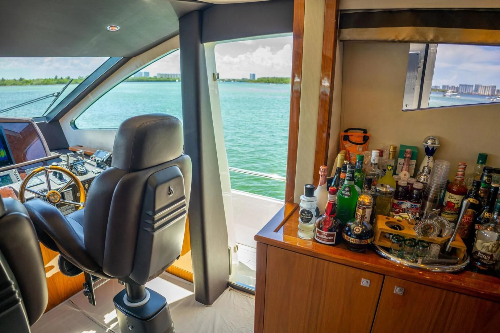 a table with bottles and cans on it aboard THE CABANA Yacht for Sale