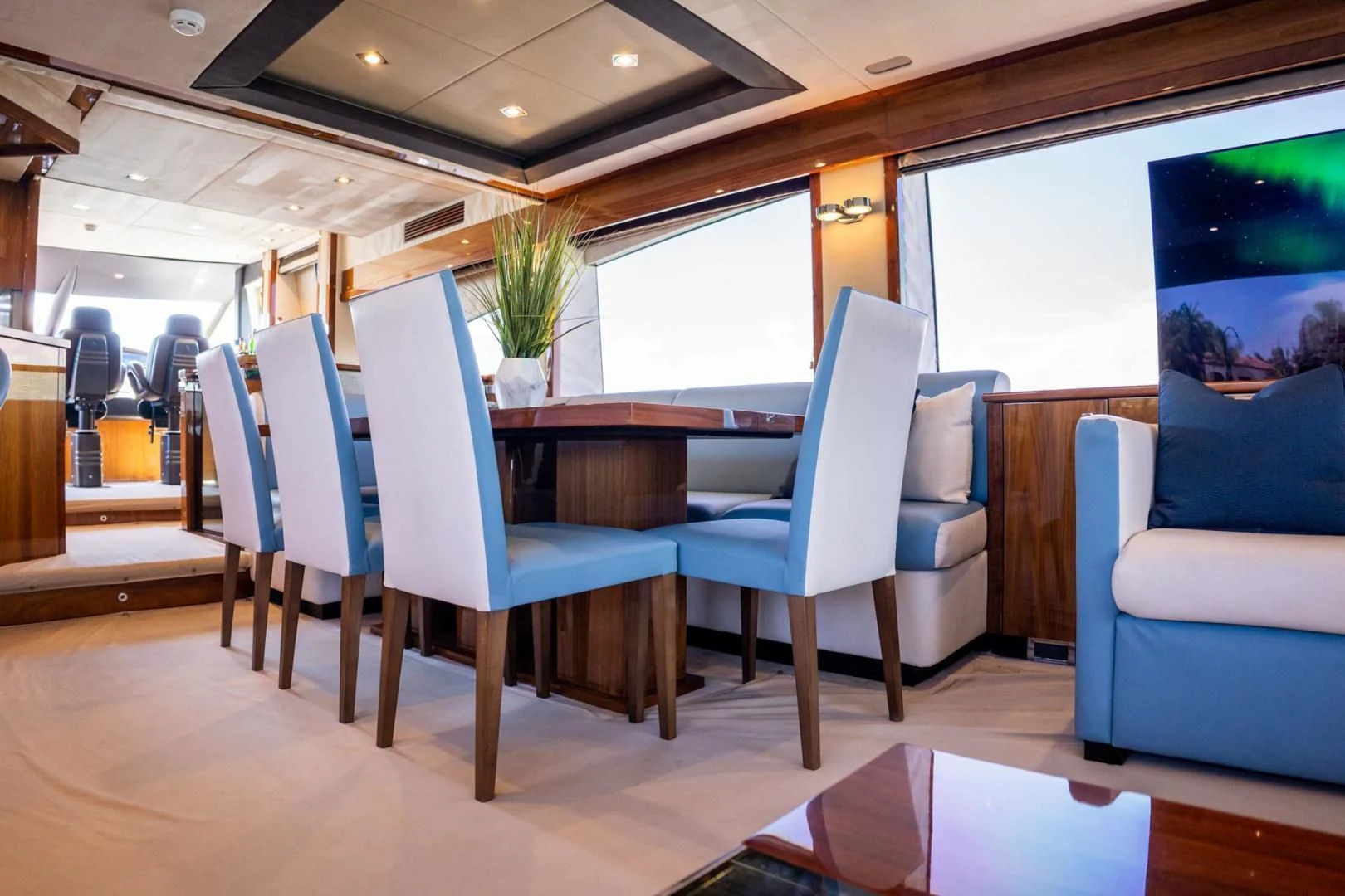 a room with a table and chairs aboard THE CABANA Yacht for Sale