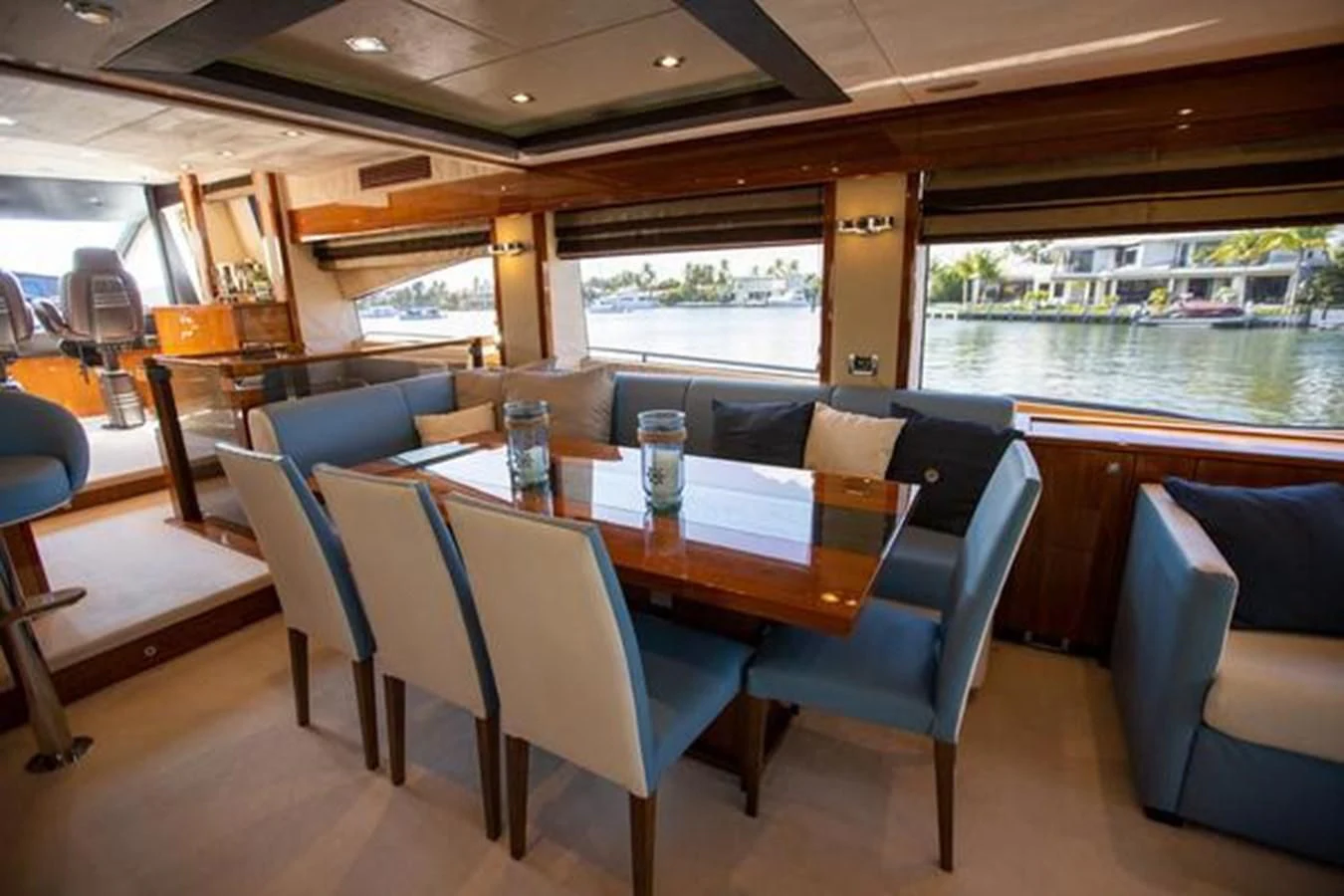 a table and chairs in a room aboard THE CABANA Yacht for Sale