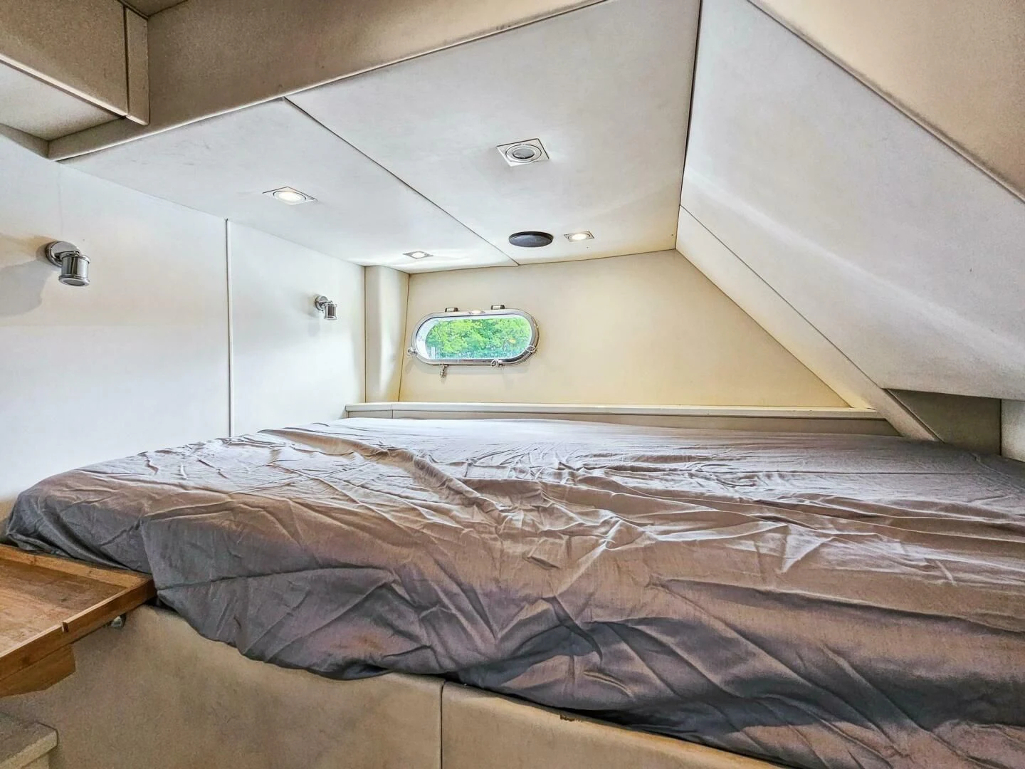 a bed in a room aboard THE CABANA Yacht for Sale