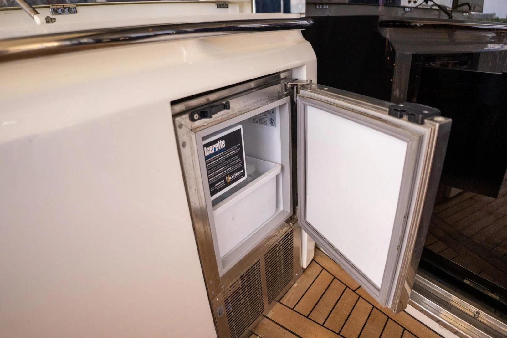 a white microwave oven aboard THE CABANA Yacht for Sale